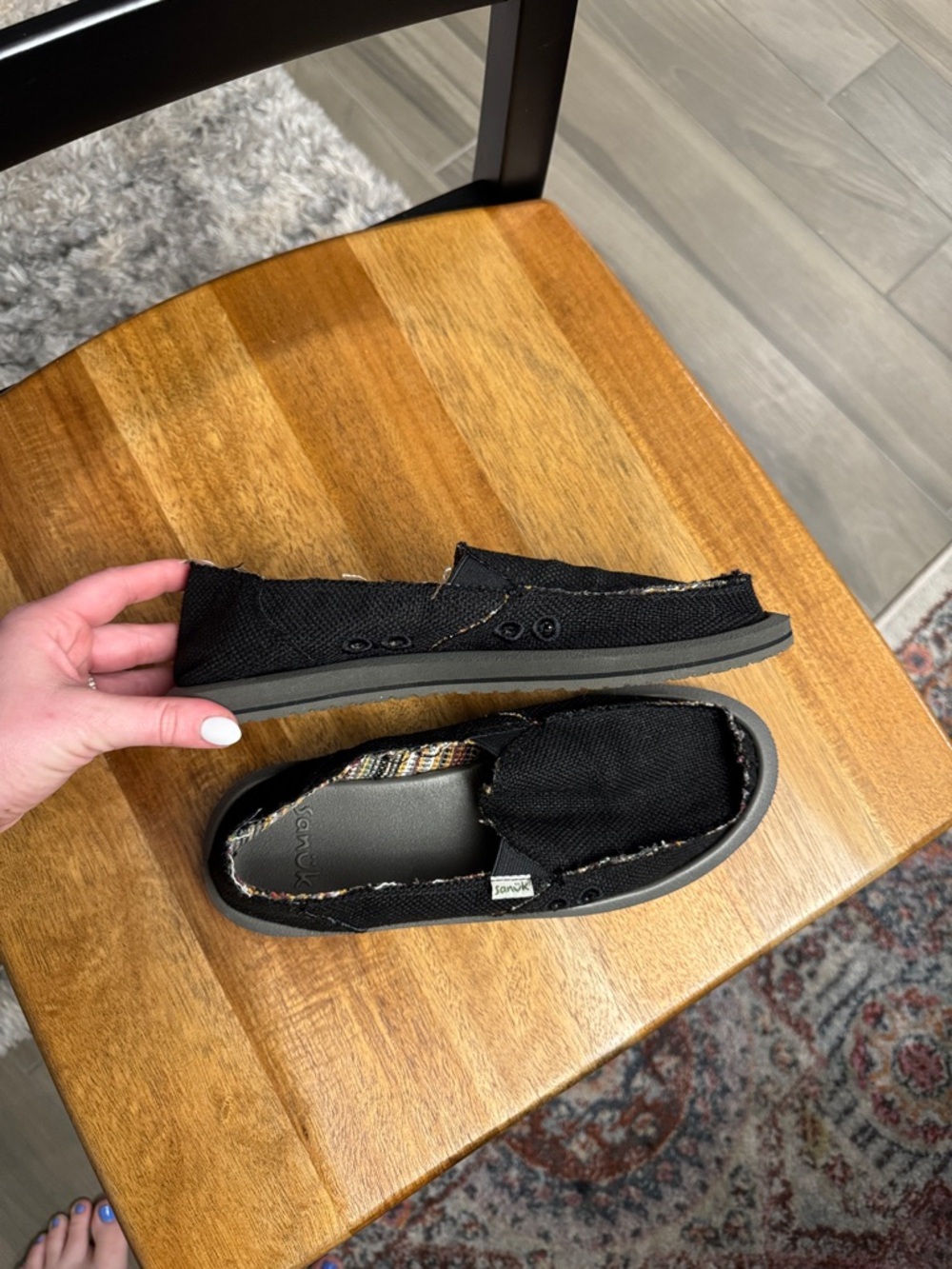 LIKE NEW Sanuk Black Canvas Slip-On shoes with Patterned Lining